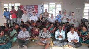 Travelers, Trust Group members, and Opportunity India staff gather for a group shot.