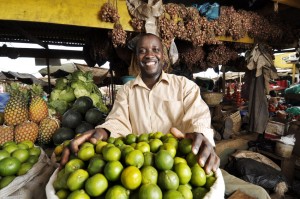 Client Godfrey Lutwama in the Kalerwe Market in Kampala, Uganda.