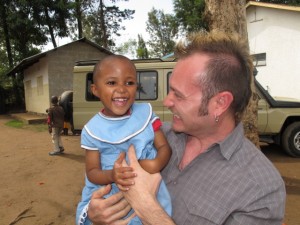 My favorite picture! Roberto and a little girl at the Faraja Centre.