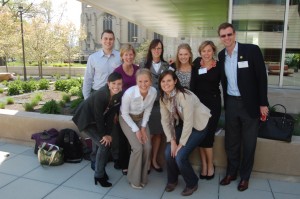 Lauren Dillon (front row, right) and her fellow YAO members at the 7th Annual Chicago Microfinance Conference.