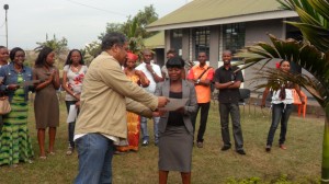 DR Congo CEO Gilbert Lagaillarde distributes certificates to the staff who participated in the workshop.