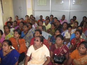 Clients receive orientation for Opportunity India’s housing loan program in June 2012.
