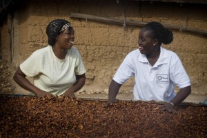 Client Agnes Fosu Hene (left) is a cocoa farmer in the Ashanti region of Ghana, getting guidance and support from her loan officer, Abena Agyakowa Nketha Sarpong (right).
