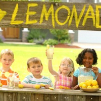 Stores in Washington set up tables and stands downtown and encouraged kids to come sell lemonade for a charitable cause.