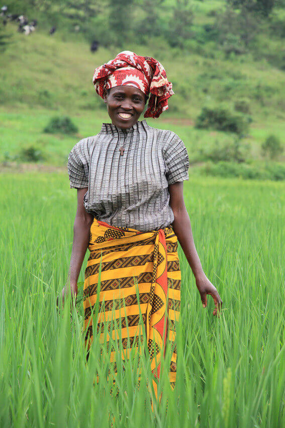 Eugenie Nyirabagenzi, a rice farmer that Opportunity International is serving in Rwanda