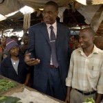 Mozambique: Dikembe Mutombo, former NBA star and member of Opportunity’s Board of Advisors, meets with a client on a visit to Mozambique.