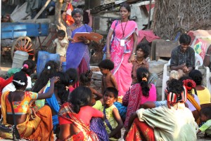 Loan officer Valamarthi (right) delivers transformational training to the Roja Trust Group, including loan client Deepa (left) in Chennai, India.