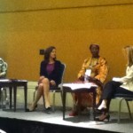 The panel of women staff and supporters exploring why women need microfinance services now.