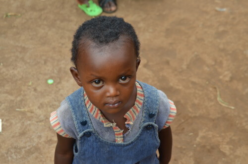 The daughter of a Rwandan dairy farmer client.
