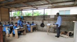 Augustine Adjei Bonnah teaches English to grade 4 students. Bonnah, who has been working at the school for five years, is the school's creative arts teacher for all grade levels.