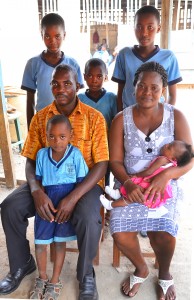 King George School’s proprietor, George Owusu Asare, with his wife, Margaret, and their five children–Pious (7), Harriett (11), Antoinette (9), Nathaniel (3), and Christiana (5 months)–who all attend the school.