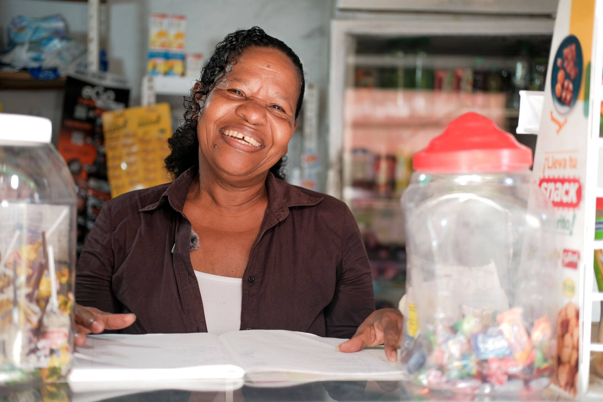 Through her savings group, Linda received two small loans to expand her pharmacy in Colombia.